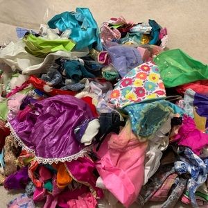 Giant bag of Barbie clothes